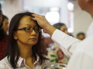 woman receiving ashes